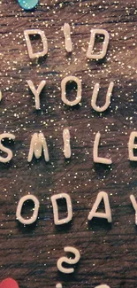 Wooden background with colorful confetti and motivational quote: 'Did You Smile Today?'