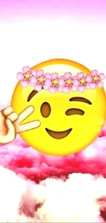 Cheerful emoji with floral crown over pink cloud background.