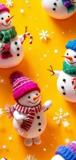 Colorful snowmen on a bright yellow background with holiday decor.