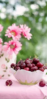 Pink flowers and cherries in a vase, bright floral wallpaper.