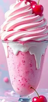 Pink cherry milkshake with creamy swirls and cherries on top.
