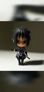 Anime chibi figure on a light background.