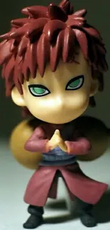 Chibi figure in maroon outfit with detailed eyes.