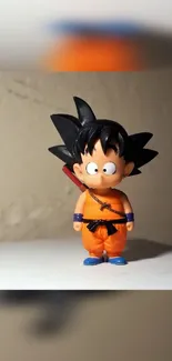 Chibi anime hero in orange outfit, standing playfully on a light background.