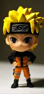 Chibi ninja character in bright yellow costume on a mobile wallpaper.