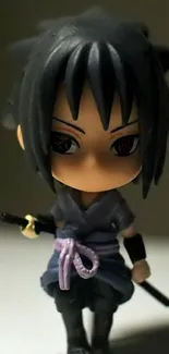 Chibi warrior figurine wallpaper with dark tones.