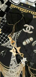 Black and gold fashion accessories wallpaper with pearls.