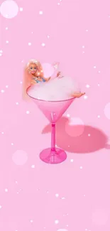 Pink themed wallpaper featuring a doll lounging in a bubbly cocktail.