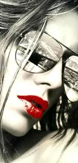 Glamorous black and white portrait with red lips and city reflection sunglasses.