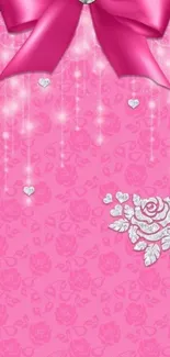 Elegant pink wallpaper with bow, lace, and floral patterns.