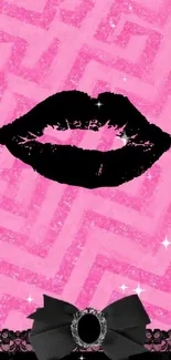 Pink background with black lips and a bow accent.