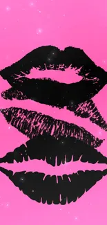 Pink wallpaper with bold black lips design.