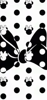 Black and white polka dot butterfly wallpaper.