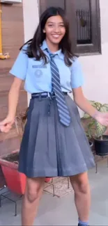 Young woman in stylish school uniform with vibrant expression.