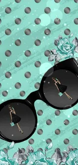 Chic sunglasses with turquoise roses and polka dot background.