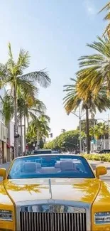 Vibrant street with palm trees and luxury yellow car in sunny city setting.