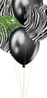 Stylish black and zebra stripe balloons with green glitter accent.