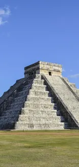 Vivid view of Chichen Itza pyramid under a clear blue sky.