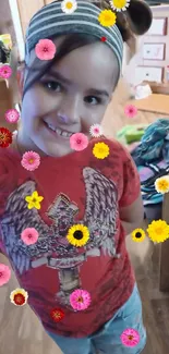 Child smiles with floating flowers around.