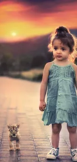 Child and cub walking on a path at sunset.