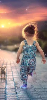 Child walking with puppy during a beautiful sunset on a cobblestone path.