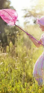 Child with net in a meadow catching a butterfly.