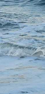 Child standing joyfully in ocean waves with a serene seascape background.