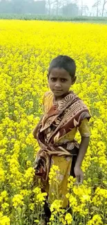 Child standing in a lush yellow mustard field.