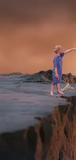 Child standing on rocky cliff edge with warm earthy sky.