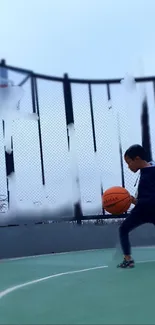 Child dribbling basketball on outdoor court.