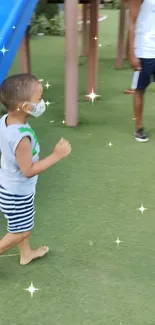 Child running in park with sparkling effect.