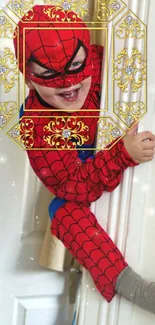 Child dressed as Spider-Man against door.