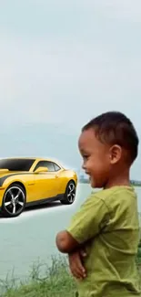 Child smiling by river with yellow car in view.