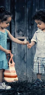 Two children sharing a dandelion against a rustic blue backdrop.