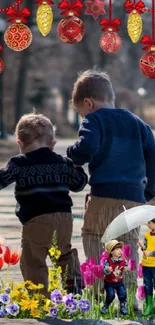 Children walking by a lake with flowers and festive decor.