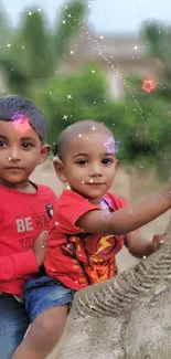 Two children with sparkling stars in an outdoor setting.