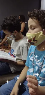 Children wearing masks while reading books, emphasizing learning and safety.