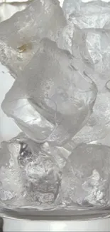 A refreshing glass of ice cubes, perfect for a cool mobile wallpaper.