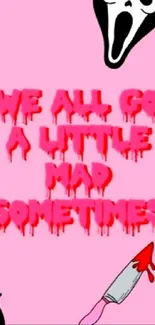 Horror-themed wallpaper with quote 'We all go a little mad sometimes' on a pink background.