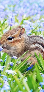 Chipmunk surrounded by vibrant spring flowers in a garden.