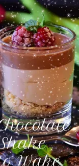 Chocolate dessert in glass with raspberries and sparkles.