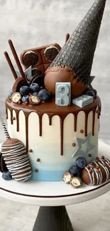 Decorative chocolate drip cake with berries and confectioneries.