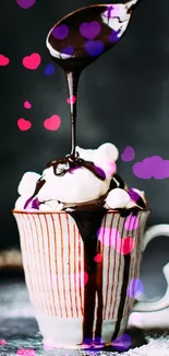 Decadent chocolate drizzle on marshmallows in a striped cup against a dark background.