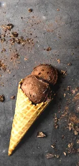 Chocolate ice cream cone on dark textured background.