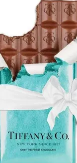 Tiffany blue wrapping paper with bitten chocolate bar.