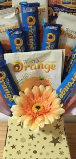 Chocolate orange bouquet with Terry's chocolates and a flower.