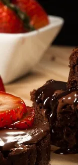 Chocolate cake topped with strawberries and rich chocolate drizzles.