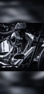 Grayscale image of a chopper motorcycle engine with chrome details.