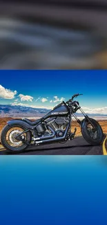 Chopper parked on a scenic desert road with a vivid blue sky backdrop.