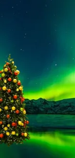 Christmas tree with aurora borealis glowing in the night sky.